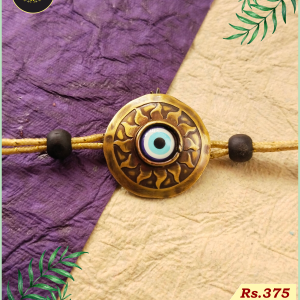 evile eye rakhi by Tamra-kasya